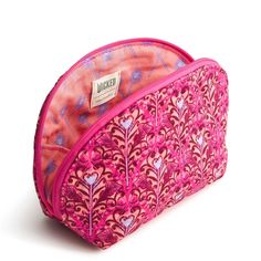 Our Mini Dome Cosmetic is perfectly sized to fit in your purse, handbag, or travel tote, making it ideal for carrying your essential makeup items on the go without taking up too much space. Whether you're touching up your makeup during the day or packing light for a weekend getaway, our compact bag offers the perfect solution for keeping your beauty essentials close at hand. Vera Bradley Wicked Mini Dome Cosmetic Bag in Bewitching Pink Essential Makeup, Mini Makeup Bag, Inside My Bag, Backpack Lunch Bag, Compact Bag, Duffel Bag Backpack, Belt Purse, Makeup Items, Stocking Stuffer Gifts