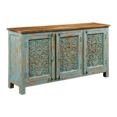 an old blue wooden cabinet with carvings on the front and side doors, isolated against a white background