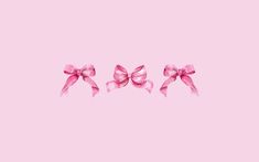 three pink bows on a pink background