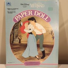 the little mermaid paper doll is in its box