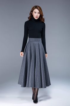 Elegant Long Gray Skirt, Elegant Gray Flowy Skirt, Long Lined Skirt Dress For Fall, Fall Long Skirt Lined Dress, Gray Flared Maxi Skirt With Lined Skirt, Gray Flared Maxi Skirt With Lining, Winter Long Pleated Dress, Winter Dress With Long Pleated Skirt, Winter Pleated Maxi Skirt