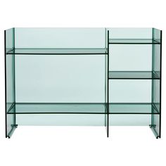 a glass shelf with shelves on each side