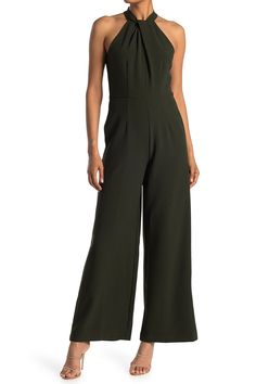 Trade in your LBD for something a bit more modern, like this halter-neck jumpsuit that can be easily dressed up or down with a change of footwear.If between sizes, order one size down. 59" regular length; 31" inseam; 28" leg opening. Keyhole back with button closure; hidden back-zip closure. High halter neck. Sleeveless. Side-seam pockets. Partially lined. 97% polyester, 3% spandex. Machine wash, tumble dry. Imported. Dresses White Halter Jumpsuit, White Lace Jumpsuit, Pinstripe Jumpsuit, Black White Jumpsuit, Halter Neck Jumpsuit, Crepe Jumpsuit, Wide Leg Romper, Jumpsuit Dressy, Lace Jumpsuit