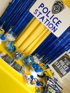 a police station display with blue and yellow decorations