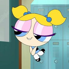 the powerpuff character is sitting in front of lockers with her eyes closed