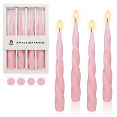 four pink candles in a white box and five smaller ones