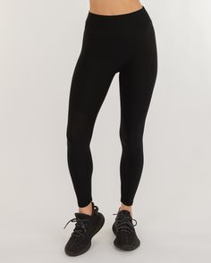 Our core basic leggings are a must have wardrobe staple, perfect for light activities to intense workouts. Designed without a front center seam to avoid discomfort and no side leg seams for a sleek look, these leggings offer unparalleled comfort. Features a V shaped waistband at the back for shaping and is high waisted without inner elastic to ensure comfort and coverage. Made in our Warm Tech fabric that is 4 way stretch, quick drying, and has brushed inside that keeps you warm. It is perfect t Sporty Tight Leggings With Ribbed Waistband, Full Length Athleisure Leggings With Ribbed Waistband, Full Length Ribbed Waistband Athleisure Leggings, Functional Full-length Athletic Fit Activewear, Athletic Fit Full Length Activewear For Training, Functional Full Length Athletic Fit Activewear, Compression Tights For Fall Workouts, Full Length Athletic Fit Activewear For Training, Functional Full Length Athletic Activewear