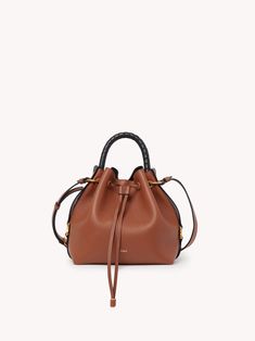 Chloé Marcie Bucket Bag | Chloé US Chloe Bucket Bag, Chloe Logo, Drawstring Bucket Bag, Gold Bag, Chloe Marcie, Black Leather Belt, Leather Bucket Bag, Leather Bucket, Chloe Bag