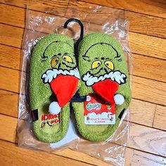 Brand New Grinch Slippers. One Size Fits Most Adult Slippers. Adult Women. Size 8.5/9. Kids Size Fits Size 13 To Kids Size 1. Toddler Fits Size 8/9. Did Tear Tag Off Thinking They Would Fit. The Kids Does Have Tag Attached. Was Tried On In House. Grinch Slippers, Grinch Shoes, Toddler Fits, Grinch, Size 13, Red Green, Slippers, Green, Red