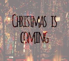 the words christmas is coming are displayed in front of an image of trees and lights