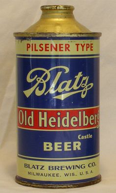 an old heidelber beer can sitting on a white surface