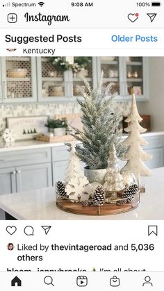 a white christmas tree sitting on top of a counter