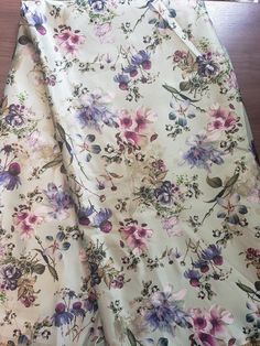 two pieces of fabric with flowers on them