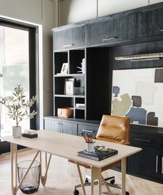 a living room filled with furniture and a large window