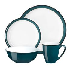 blue and white dinnerware set with matching cups