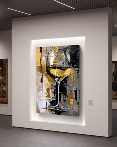 a painting on display in a museum with wine glasses and paintings behind the glass wall