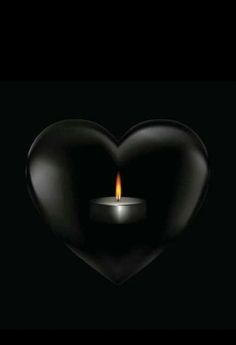 a candle in the shape of a heart