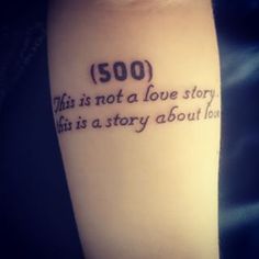 a person with a tattoo on their arm that says, 500 this is not a love story what is a story about love