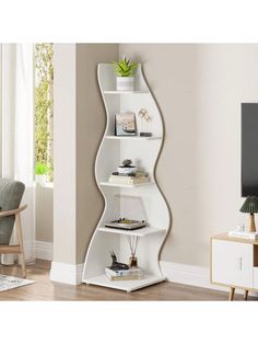 the corner shelf is white and has three shelves on each side, with bookshelves in