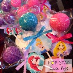 some kind of cake pops with princess pictures on them