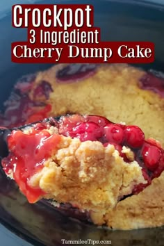 crockpot 3 ingredient cherry dump cake on a plate with a spoon in it