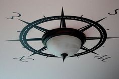 a clock that is mounted to the ceiling