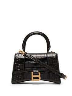 black leather crocodile effect gold-tone logo plaque single rounded top handle adjustable detachable shoulder strap foldover top with magnetic fastening main compartment internal logo stamp internal zip pocket made in Italy Balenciaga Hourglass Bag, Sacs Tote Bags, Balenciaga Leather, Luxury Purses, Balenciaga Bag, Black Leather Handbags, Black Shoulder Bag, Logo Stamp, Black Tote Bag