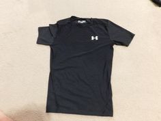 UNDER ARMOUR MENS HEAT GEAR  SHORT SLEEVE FITTED SHIRT SIZE X LARGE This is used men's short sleeve shirt by Under Armour , size X L, measurement : armpit to armpit 18" ( circle 36"), total length : 27",  shoulder to shoulder: 16", Under Armour logo on front and back ,  made in Mexico , black color.  SHOW WEAR ON THE  FRONT UNDER ARMOUR LOGO please check photos for detail.   FREE SHIPPING IS FOR US AND APO ADDRESS ONLY!!! I only ship to the address provided by Paypal. Please make sure that your Under Armour Short Sleeve Workout Top, Short Sleeve Under Armour Workout Top, Under Armour Sporty Shirt For Sports, Sporty Under Armour Shirt For Sports, Sporty Under Armour Sports Shirt, Under Armour Short Sleeve Sports Shirt, Under Armour Sports Shirt, Under Armour Logo, Fitted Shirt