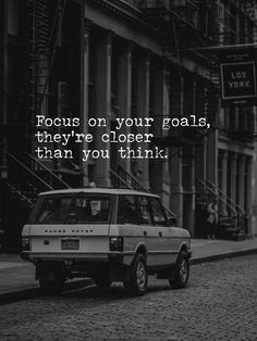 a black and white photo with the words focus on your goals, they're closer than you think