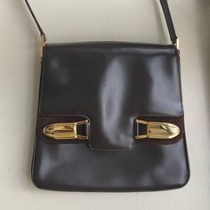 Vintage Gucci Leather Bag. Has Interior Logo And Interior Gucci Zipper. Front Clasp Won’t Connect But Otherwise Great Condition For A 60s/70s Bag Gucci Shoulder Bag With Brass Hardware For Evening, Gucci Shoulder Bag With Brass Hardware For Formal Occasions, Gucci Formal Shoulder Bag With Brass Hardware, Retro Gucci Rectangular Shoulder Bag, Vintage Gucci Shoulder Bag For Formal Occasions, Elegant Gucci Bag With Brass Hardware, Gucci Vintage Shoulder Bag For Business, Vintage Gucci Shoulder Bag For Business, Gucci Brown Shoulder Bag With Brass Hardware