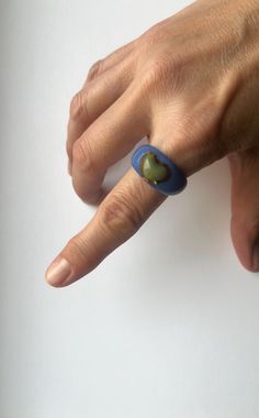 This porcelain ring with 24k gold is made out of porcelain and fired in special ceramic kiln three times on high temperature of 1220oC (2228oF). That high temperature made this ring very strong, but the ring is still fragile.  It's recommended to wear this ring just in special moments in your life, gold can fade by frequent friction and wetting. If you handle with care, the ring will last forever. If you are not sure about your ring size, please compare your ring with a picture of the porcelain ring. Important note - your porcelain ring should be 1/2 or 1/4 bigger than the ring you wear. I make rings in one size, so there is no way to change it for the same one in a different size. If you need more information, please send me a message. Ring is ready for shipping. Porcelain Ring, Ceramic Kiln, Make Rings, Blue Porcelain, Green Heart, Signet Rings, Handle With Care, Signet Ring, Special Moments