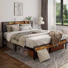 a bedroom with a bed, dressers and window in it's center area