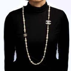 This is part of Chairish’s Costume Jewelry assortment.  Pre-owned Chanel graduated faux pearl necklace (or belt) crafted in silver tone (circa 2012).   The necklace features graduated 6mm to 12mm faux white pearls. Two CC logos separate the beads. The necklace can be worn as a long 48 inch chain or wrapped as a double strand necklace. Also great for wear as a belt.    The necklace is in very good condition showing minimal wear. Chanel travel pouch also included.   Particulars:  Weight: 136.6 gra Chanel Pearl Necklace Outfit, Long Pearl Necklace Outfit, Long Necklace Outfit, Pearl Necklace Outfit, Chanel Pearl Necklace, Chanel Jewelry Necklace, Double Strand Pearl Necklace, Coco Chanel Fashion, Necklace Outfit