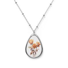 Introducing our June Birth Flower Necklace, a timeless and exquisite piece that captures the elegance and romance of the rose, the birth flower of June. The delicate pendant showcases the intricate details of a blooming rose, beautifully crafted to symbolize love, beauty, and passion. Suspended from a delicate chain, this necklace is a perfect gift for those born in June or anyone who appreciates the timeless allure of the rose. The pendant and its chain are made with robust brass material for dazzling looks that are long-lasting. The print panel is made with aluminum while the pendant itself comes in a unique shape of an ellipse. -Zinc alloy pendant and necklace chain -Ellipse-shaped pendant -White aluminum print surface Personalized Elegant Rose-colored Jewelry, Elegant Rose Flower Pendant Charm Necklaces, Elegant Rose Gold Flower Charm Necklaces, Elegant Rose Gold Flower Charm Necklace, Elegant Rose Design Charm Necklace Gift, Elegant Rose Design Charm Necklace For Gift, Elegant Rose Flower Necklace With Rose Design, Elegant Rose Necklace For Her, Elegant Rose Design Necklace For Mother's Day