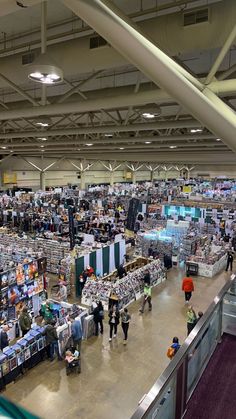 an overhead view of people shopping in a large store with lots of items on the shelves