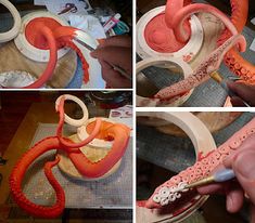 the process of making an octopus sculpture with wood and paper maching it's teeth