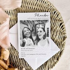 two women are smiling and posing for a photo on the front of an envelope that says please