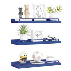 three shelves with various items on them and one shelf has a clock, air plant, vases, and other decorations