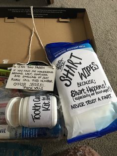 an open box containing toothpaste and other items