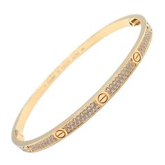 About This Piece: Discover the epitome of elegance with this Authentic Cartier 18k Yellow Gold Love Bangle. Symbolic screw motifs punctuate the warm, romantic hue of the bracelet, interlaced with brilliant-cut pave diamonds for captivating sparkle.... Trinity Bracelet, Modern Bangle, Love Bangle, Hermes Jewelry, Modern Bracelets, Yellow Gold Bangle, Diamond Bangles Bracelet, Gold Bangle Bracelet, Diamond Bangle