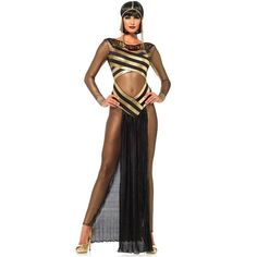 a woman wearing a black and gold costume with sheer cutouts on the sides, standing in front of a white background