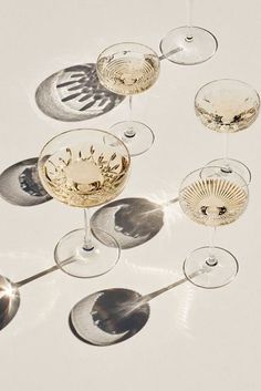 several wine glasses with different shapes and sizes