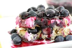 a close up of a plate of food with blueberries