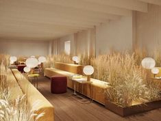 a room filled with lots of couches and tables next to tall grass covered walls