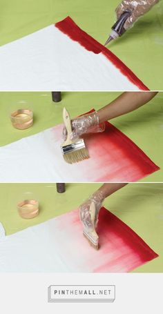 the process of painting a piece of paper with red and white paint, including brush