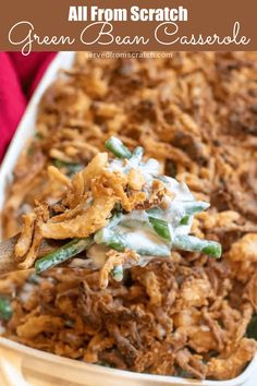 a casserole dish with green beans, onions and sour kraut in it