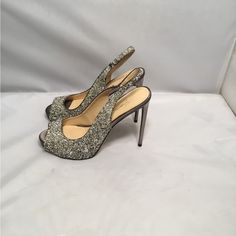 Not Your Typical Shoes. Party Up. This Is Parv- Glamour Glitter Silver And Gold Intertwined In A Beautiful Grey Sateen Sling Back Platform Heel Shoes . Shoes Are New No Box Store Display But, No Flaws. Heels Measurements Approximately 5” The Shoes It’s A Show Stopper. Sparkling Glamorous Heels For Party Season, Glamorous Sparkling Heels For Gala, Silver Open Toe Party Heels, Silver Sequined Heels For Spring, Spring Silver Sequin Heels, Sparkling Heels For Formal Evening Events, Glamorous Glitter Heels, Glitter Heels For Night Out Elegant Style, Sparkling Fitted Heels For Holiday