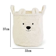 a white teddy bear storage bag with the measurements for it's size and height