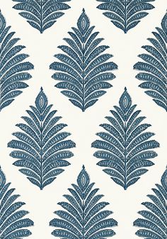 a blue and white wallpaper with leaves on it