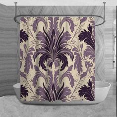 a bathroom with a shower curtain that has purple flowers on it